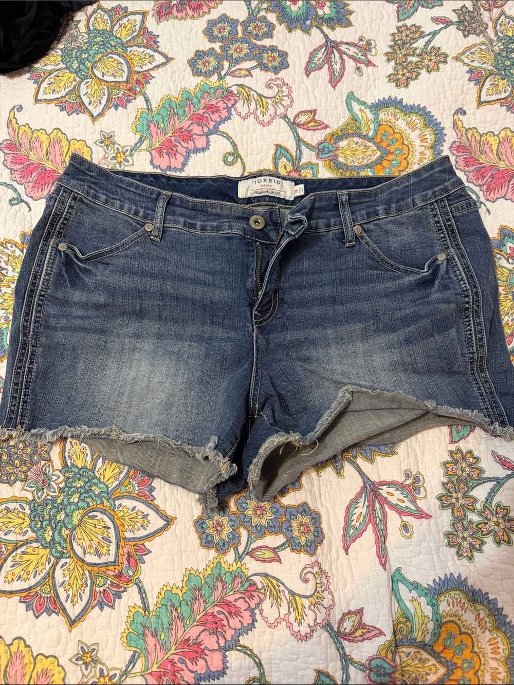 torrid dark indigo frayed denim cutoffs